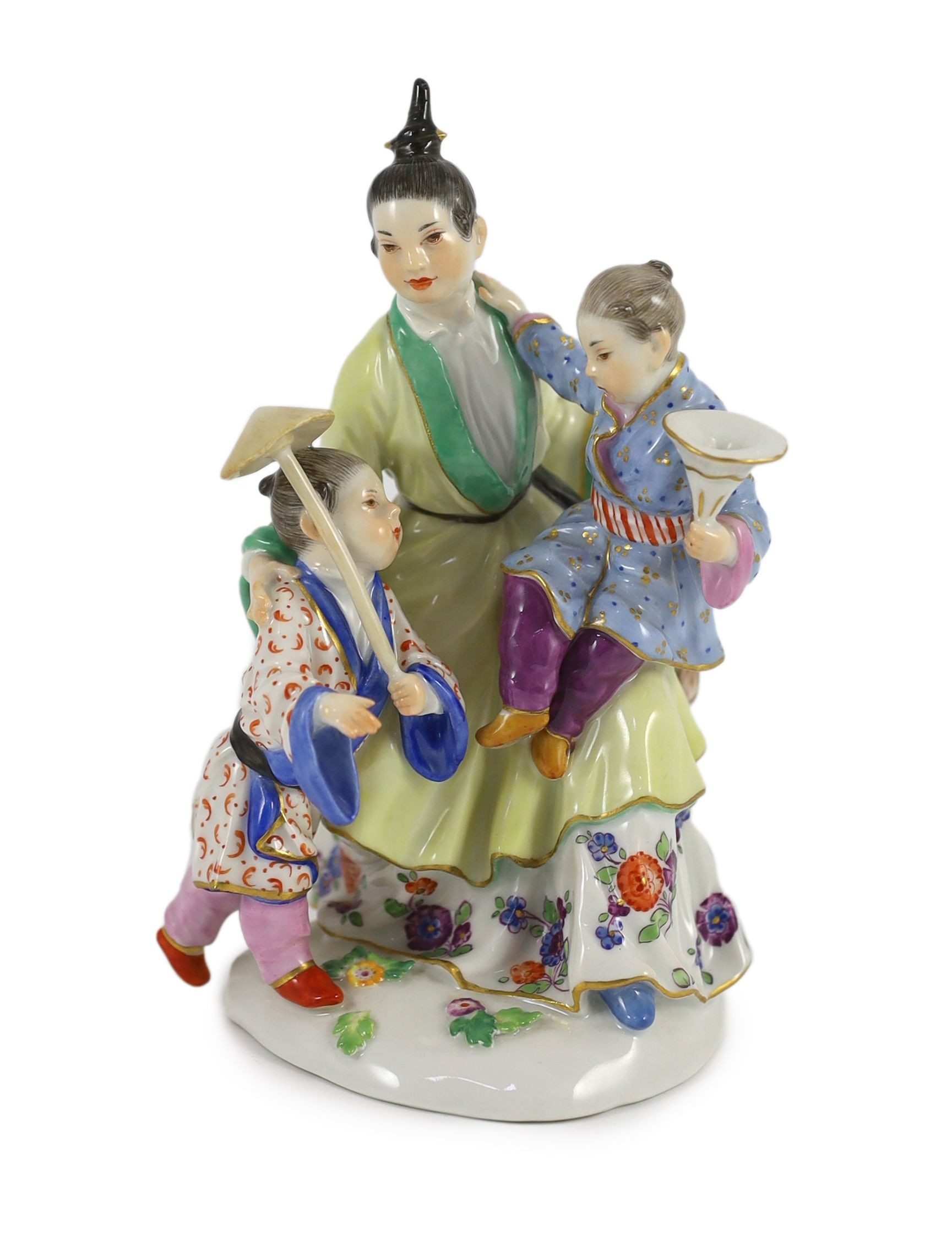 A Meissen group of a Chinese woman and two children, 20th century, 14.5 cm high